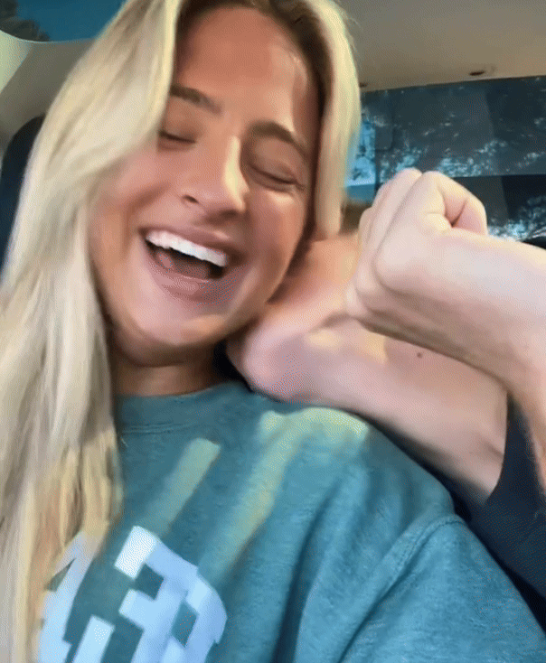 Happy woman laughing with her partner